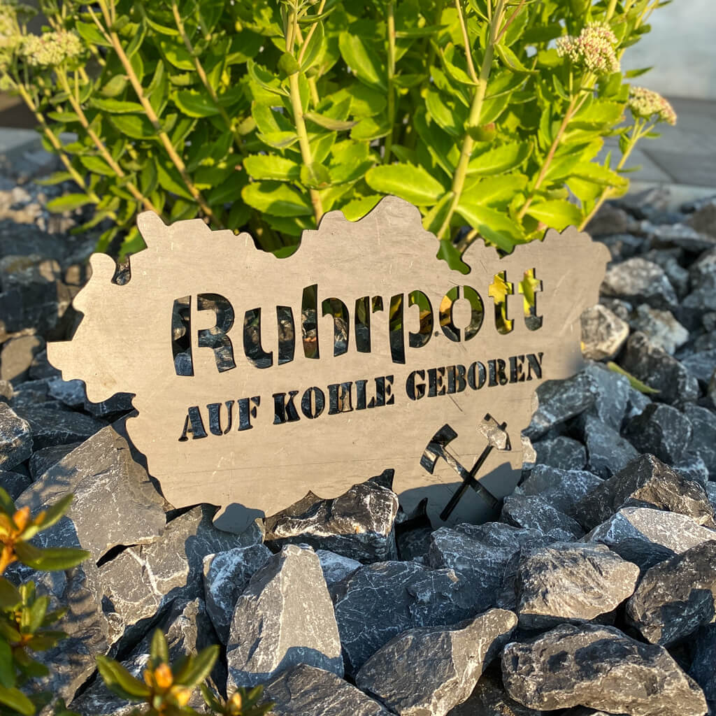 Der Ruhrpott Umriss mit Auf Kohle geboren in Walzblau